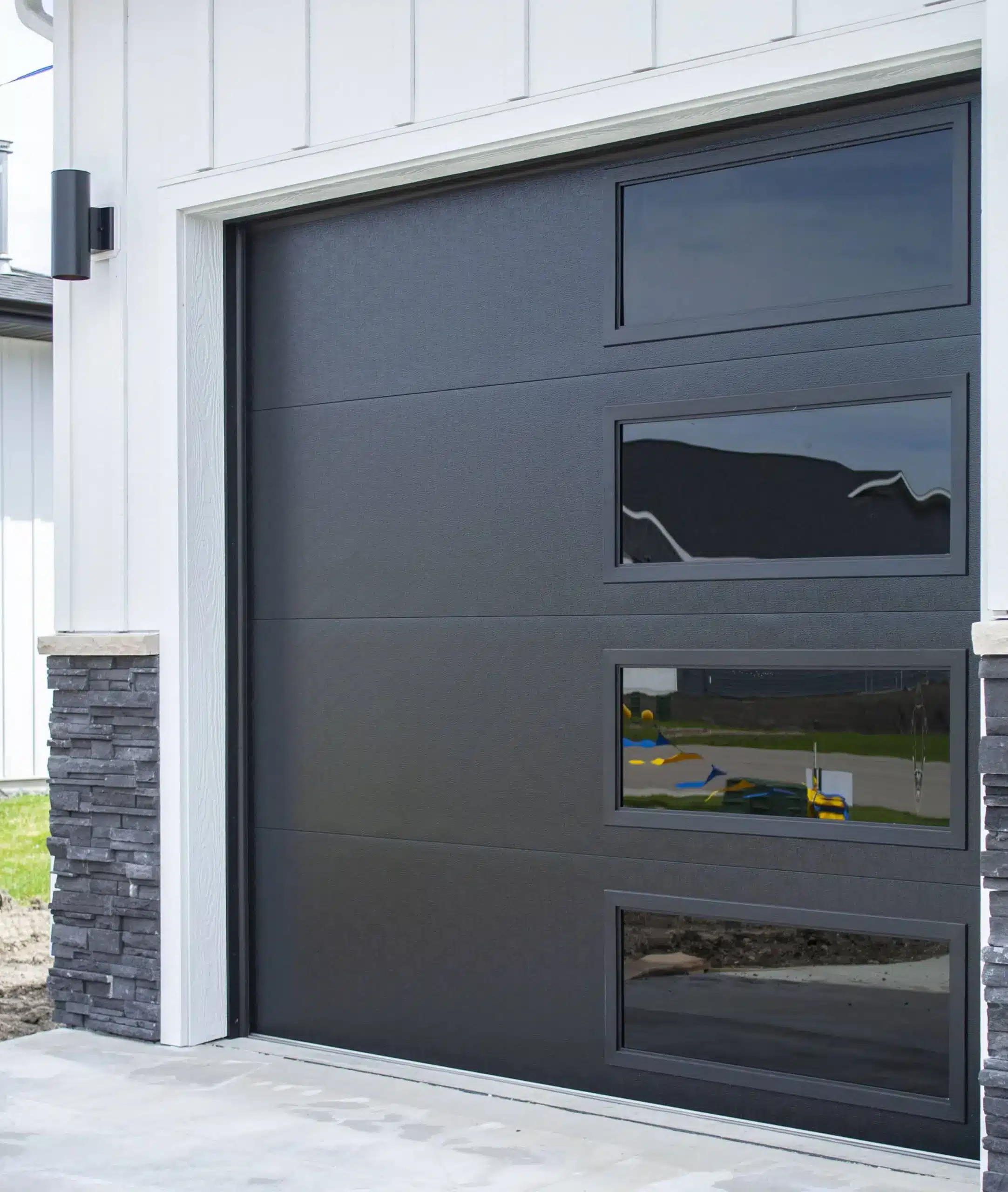 Modern black flush garage door